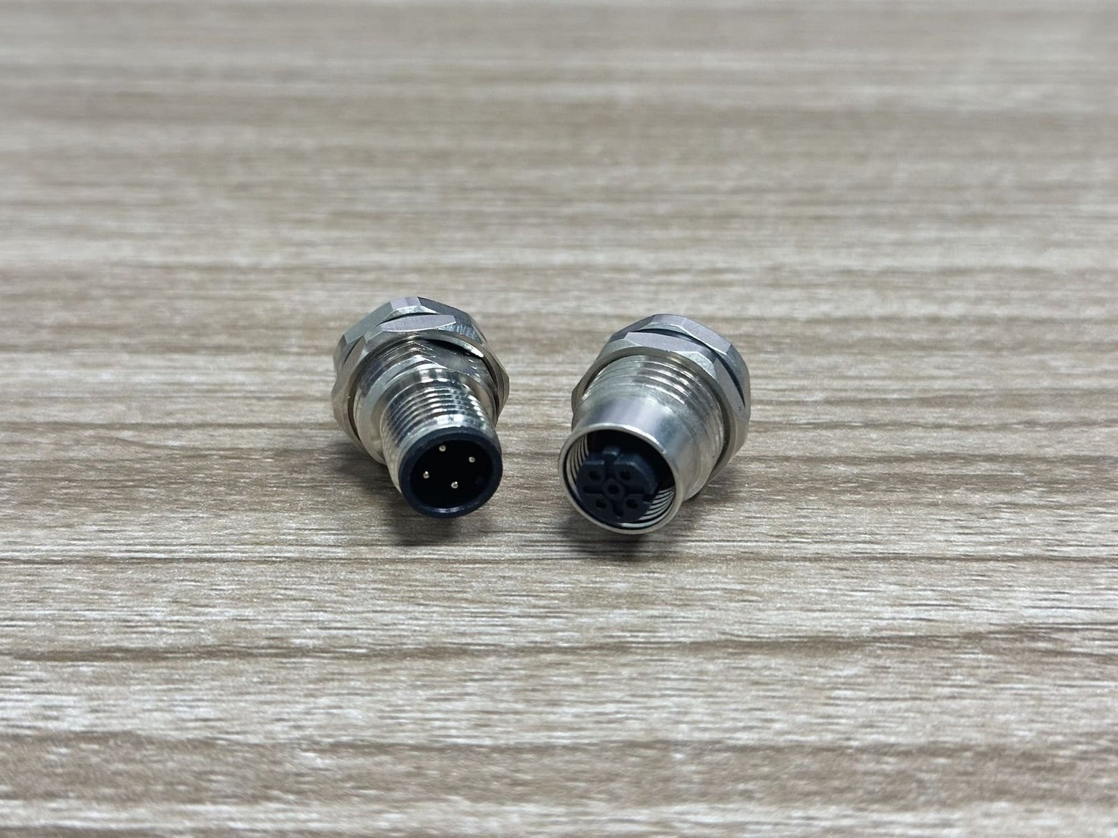 Male and female M12 connectors shown from the front and side