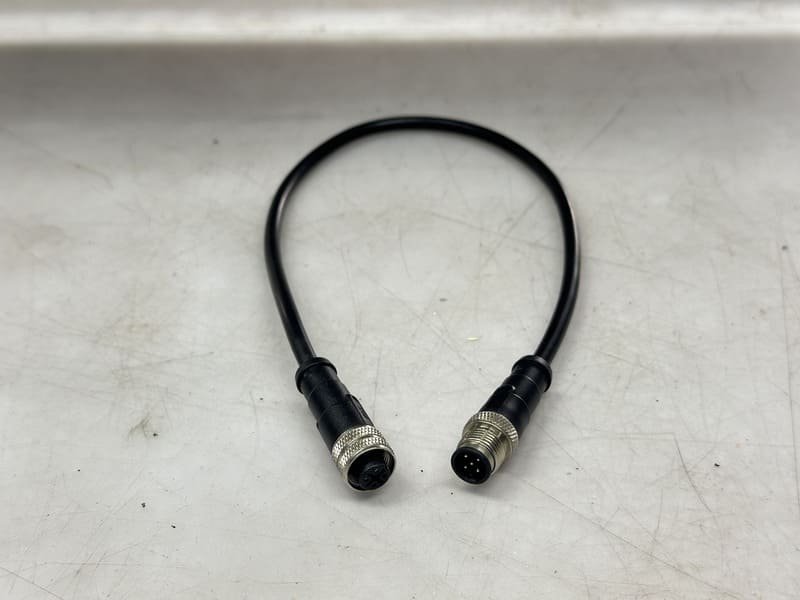 Close-up of M12 male pins and female sockets
