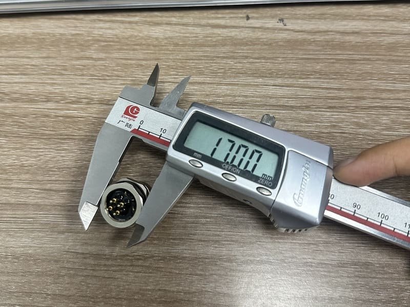 Verify connector pin layout before PCB production Caliper and engineering drawing used to verify a PCB connector footprint