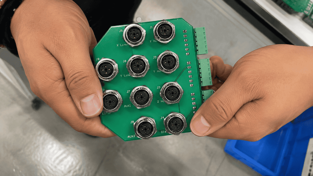 Panel-mount M12 connector sealing on an industrial enclosure Panel-mount waterproof M12 connector